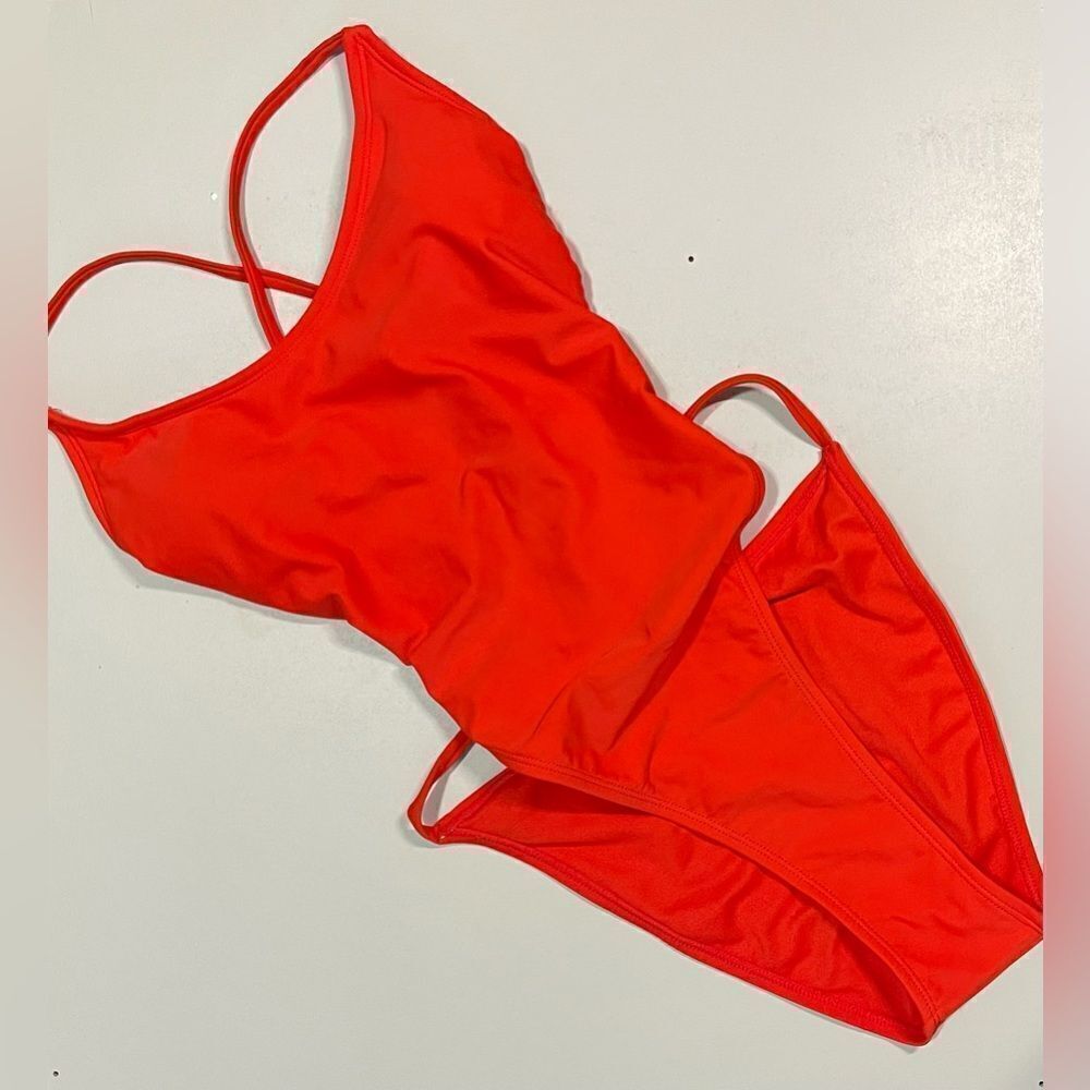 Super cute Women’s Red one piece with open lace up back.